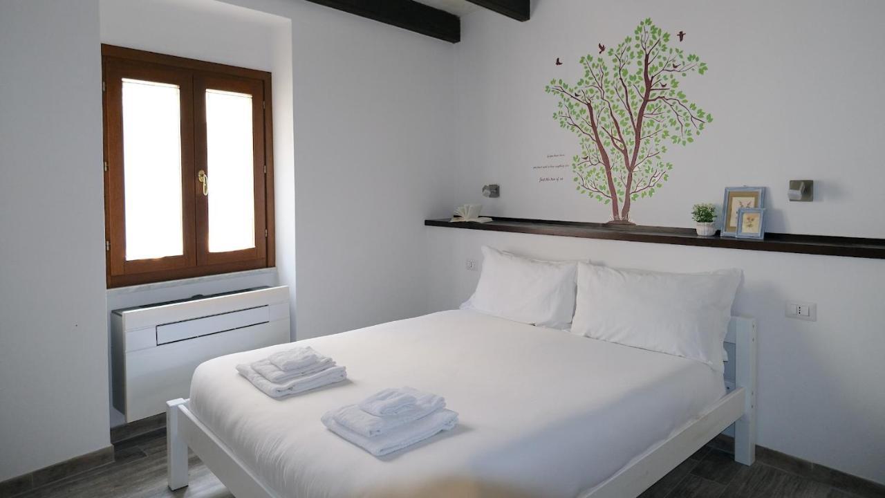 Welcomely - Santa Chiara Apartment Alghero Bagian luar foto