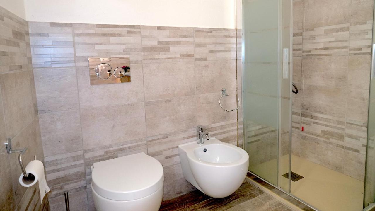 Welcomely - Santa Chiara Apartment Alghero Bagian luar foto